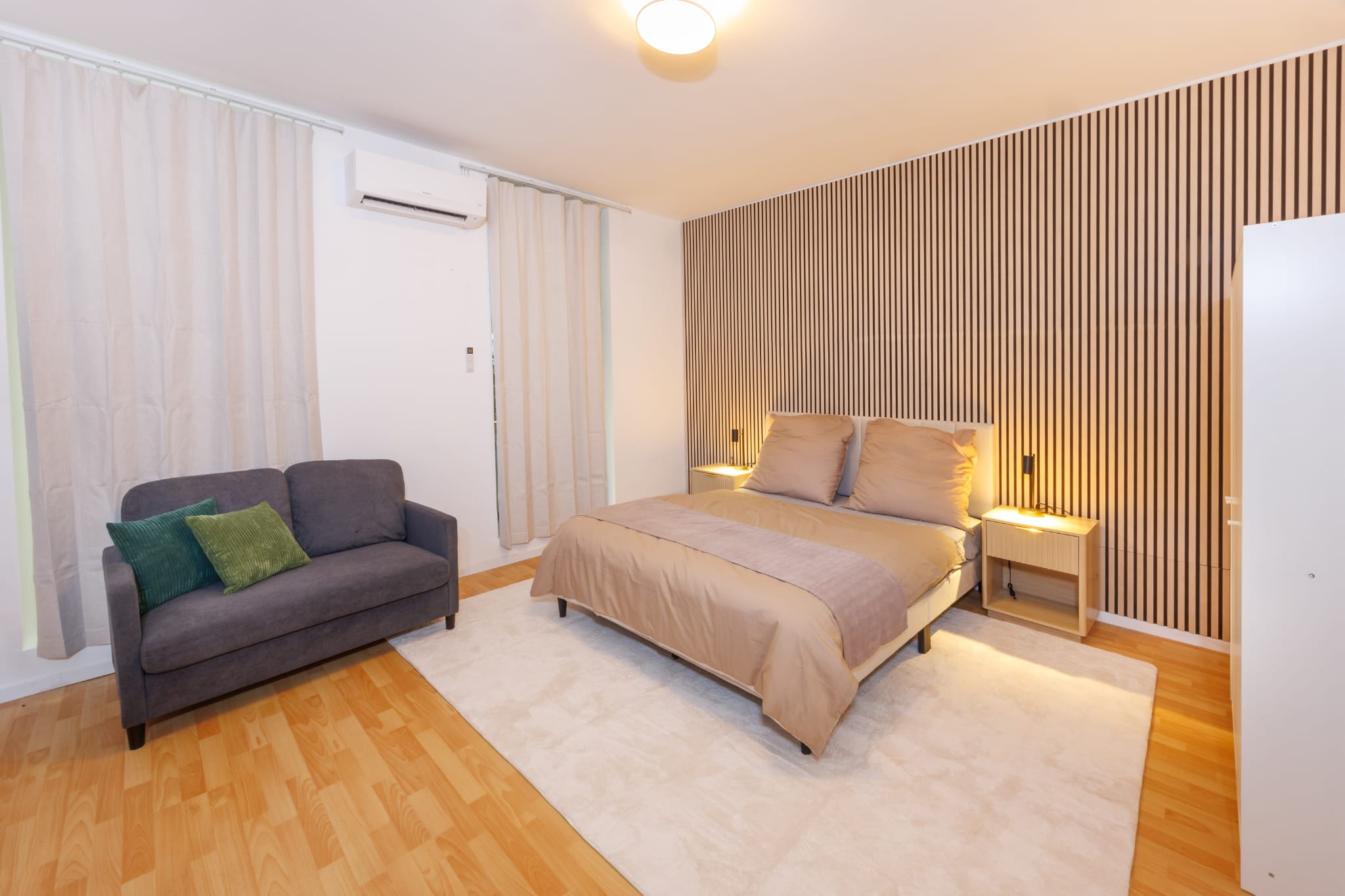 Bright Radiant apartment with a double bed, sofa and air conditioning